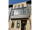 Newly built home with brick exterior, modern windows, and stylish architectural details on a sunny day at 124 1St. Se Ave, Carmel, IN 46032