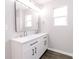 Bathroom vanity with double sinks, sleek fixtures, and a large mirror, perfect for daily routines at 1305 W 23Rd St, Indianapolis, IN 46208