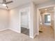 Cozy bedroom leading to an en-suite bathroom and featuring plush carpeting at 1305 W 23Rd St, Indianapolis, IN 46208