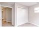 Clean bedroom featuring neutral walls, plush carpet and a double door closet at 1305 W 23Rd St, Indianapolis, IN 46208
