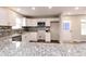 Beautiful kitchen with granite counters, stainless steel appliances, and lots of storage at 1305 W 23Rd St, Indianapolis, IN 46208