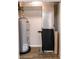 Utility room with a water heater, and HVAC system in a closet at 1305 W 23Rd St, Indianapolis, IN 46208