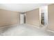 Bedroom with neutral walls and carpet and an attached bathroom at 2207 Rome Dr # B, Indianapolis, IN 46228