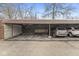A covered carport offering designated parking with ample space for vehicles at 2207 Rome Dr # B, Indianapolis, IN 46228
