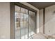 View of a sliding glass door from the patio with view of outside landscape and sky at 2207 Rome Dr # B, Indianapolis, IN 46228