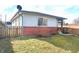 Spacious backyard featuring a well-maintained lawn and mature shrubbery at 2847 Merts Dr, Indianapolis, IN 46237