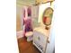 Well-lit bathroom with tub, a modern vanity, and stylish décor at 2847 Merts Dr, Indianapolis, IN 46237