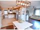 Bright kitchen featuring stainless steel appliances, white cabinetry, and stylish lighting, perfect for modern living and entertaining at 2847 Merts Dr, Indianapolis, IN 46237
