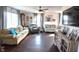 Spacious living room with hardwood floors, comfortable seating, and natural light at 2847 Merts Dr, Indianapolis, IN 46237