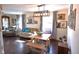 Bright living room with dining table, hardwood floors, and ample natural light at 2847 Merts Dr, Indianapolis, IN 46237