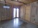 Unfinished basement with double french doors for outside access and a separate wooden door at 3060 N Alaska Rd, Cloverdale, IN 46120