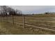 View of the property with a fence in the foreground at 3060 N Alaska Rd, Cloverdale, IN 46120