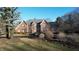 A stunning home with a brick facade, lush landscaping, and a well-maintained lawn at 3370 Walnut Creek Ct, Carmel, IN 46032