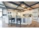 Large kitchen features a center island, modern appliances, and an eat-in bar with seating at 3370 Walnut Creek Ct, Carmel, IN 46032