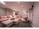 Cozy finished basement with a sectional couch and accent lighting; perfect for relaxing at 3370 Walnut Creek Ct, Carmel, IN 46032