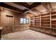 Wood-paneled office with custom built-ins and natural light at 3370 Walnut Creek Ct, Carmel, IN 46032
