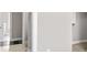 Neutral walls and trim create an open, airy hallway at 4248 Stone Lake Dr, Zionsville, IN 46077