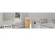 Laundry room features marble countertops, white cabinets, and a utility sink at 4248 Stone Lake Dr, Zionsville, IN 46077