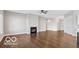 Bright living room with hardwood floors, a fireplace, and an open-concept design at 4248 Stone Lake Dr, Zionsville, IN 46077