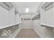 Spacious walk-in closet with ample shelving and storage space; a haven for organization at 4248 Stone Lake Dr, Zionsville, IN 46077