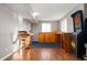Finished basement with a recreational area featuring a bar setup, dartboard, and stylish wood accents at 4431 Hickory Stick Row, Greenwood, IN 46143