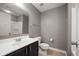 Bathroom featuring a single sink vanity, toilet, and tiled flooring at 4431 Hickory Stick Row, Greenwood, IN 46143