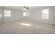 Bedroom with neutral carpet, three windows, and a ceiling fan at 4431 Hickory Stick Row, Greenwood, IN 46143