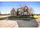 Charming two-story brick home with well-kept lawn, mature trees, and curb appeal at 4431 Hickory Stick Row, Greenwood, IN 46143