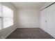 Bedroom features window and double door closet at 475 Glenn Villa Ln # 144, Avon, IN 46123