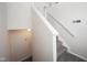 Bright foyer with carpeted stairs and white walls, leading to the upper level of the home at 475 Glenn Villa Ln # 144, Avon, IN 46123