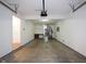 Spacious garage with concrete floor, utility connections, and ample storage space at 475 Glenn Villa Ln # 144, Avon, IN 46123