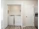 Conveniently located laundry room including a modern washer and dryer set, with easy access near the kitchen at 475 Glenn Villa Ln # 144, Avon, IN 46123