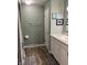 This bathroom features a vanity with a sink and mirror, along with neutral paint at 530 Lansdowne Rd, Indianapolis, IN 46234