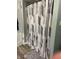 This bathroom features a modern shower curtain with neutral paint at 530 Lansdowne Rd, Indianapolis, IN 46234