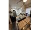 Functional kitchen with ample cabinet space, stainless steel appliances, and a cozy dining area at 5317 E 20Th Pl, Indianapolis, IN 46218