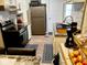 Well-lit kitchen featuring modern appliances, and neutral tones at 5317 E 20Th Pl, Indianapolis, IN 46218