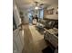Inviting living room features a large sofa, stylish chairs, modern decor and hardwood flooring at 5317 E 20Th Pl, Indianapolis, IN 46218