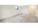 Bright bedroom with a window and neutral carpet at 5549 Hollister Dr, Indianapolis, IN 46224
