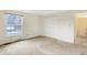 Bedroom featuring a window with natural light and a closet with bi-fold doors at 5549 Hollister Dr, Indianapolis, IN 46224