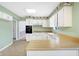 Eat-in kitchen with white cabinets, updated appliances, and lots of counter space at 5549 Hollister Dr, Indianapolis, IN 46224