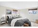 Comfortable main bedroom with a relaxing atmosphere, modern decor, and lots of natural light at 5549 Hollister Dr, Indianapolis, IN 46224