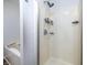 Clean bathroom featuring a bathtub with chrome fixtures and shower with wall-mounted storage at 6608 Rushing, Noblesville, IN 46062