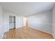 Spacious bedroom boasts hardwood floors, neutral walls, and a closet for ample storage space at 6608 Rushing, Noblesville, IN 46062