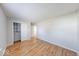Spacious bedroom boasts hardwood floors, neutral walls, and a closet for ample storage space at 6608 Rushing, Noblesville, IN 46062
