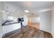 Charming kitchen with breakfast bar seamlessly flowing into the dining and living areas at 6608 Rushing, Noblesville, IN 46062