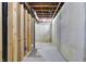 The bare basement walls and utilities are visible in this unfished basement at 6775 W Woodcrest Dr, Greenfield, IN 46140