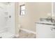 Bathroom with vinyl flooring, granite vanity top, and a shower-tub at 6775 W Woodcrest Dr, Greenfield, IN 46140