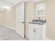 A sleek new vanity with marble countertop and contemporary faucet complements the well-lit new bathroom at 6775 W Woodcrest Dr, Greenfield, IN 46140