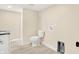 A newly installed bathroom features stylish fixtures and a laundry area hookups at 6775 W Woodcrest Dr, Greenfield, IN 46140