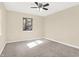 Bedroom with neutral carpet, ceiling fan, a window for natural light at 6775 W Woodcrest Dr, Greenfield, IN 46140